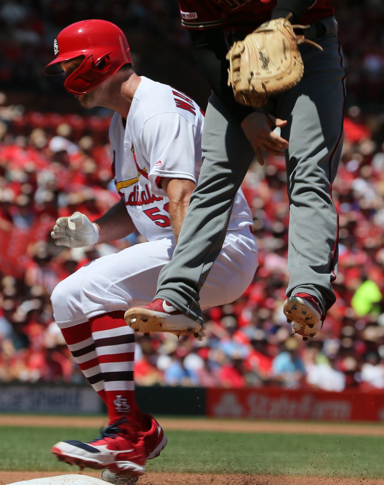 Cards rattle the Diamondbacks 5-2